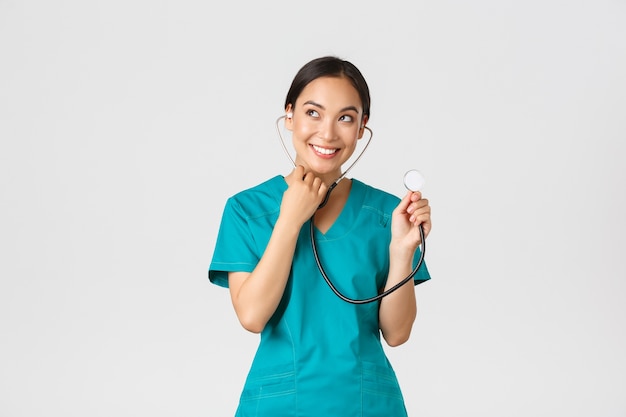 Portrait of a beautiful Asian nurse posing