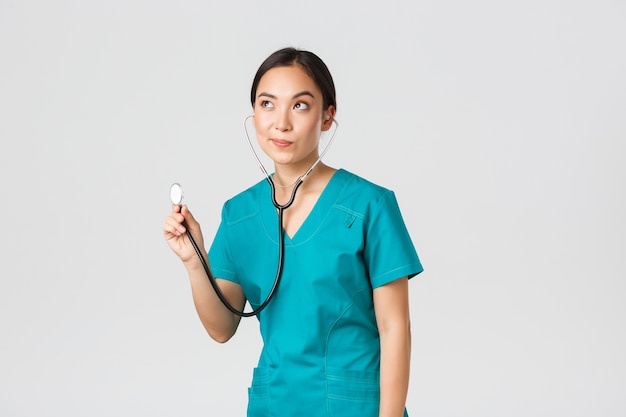 Portrait of a beautiful Asian nurse posing