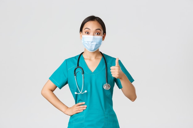 Portrait of a beautiful Asian nurse posing