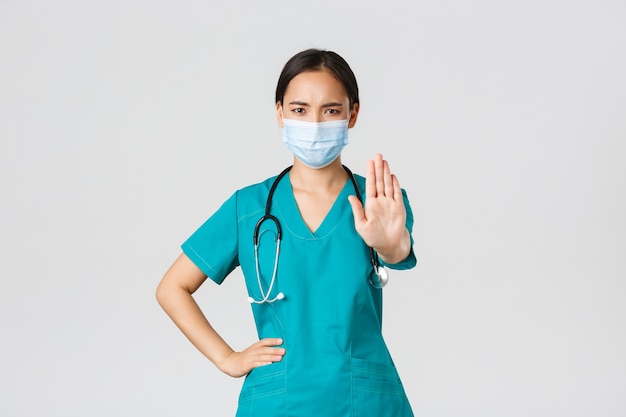 Portrait of a beautiful Asian nurse posing