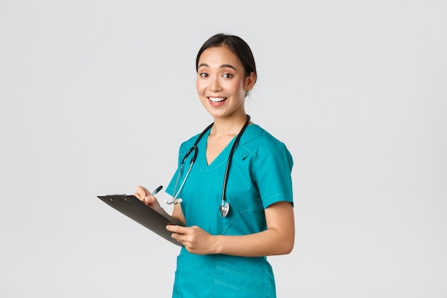 Photo portrait of a beautiful asian nurse posing