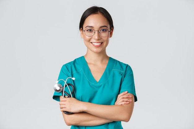 Portrait of a beautiful Asian nurse posing