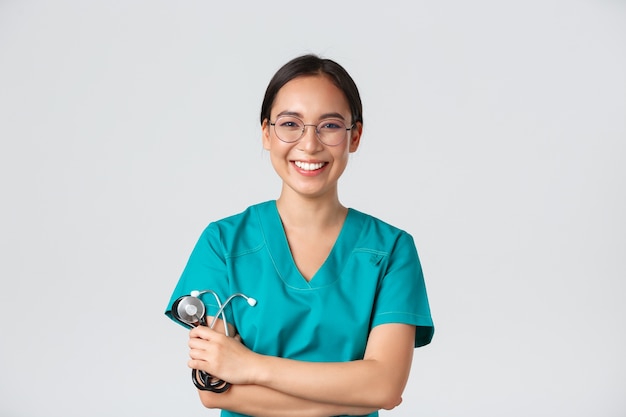 Portrait of a beautiful Asian nurse posing