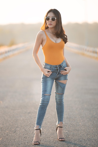 Premium Photo | Portrait of beautiful asian woman at the field on  sunsetthailand people