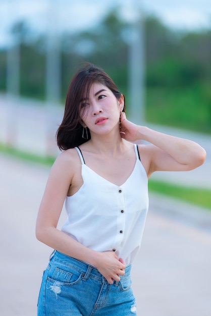 Portrait of beautiful asian woman gold hair outdoorHappy woman conceptLifestyle of modern girlThailand people