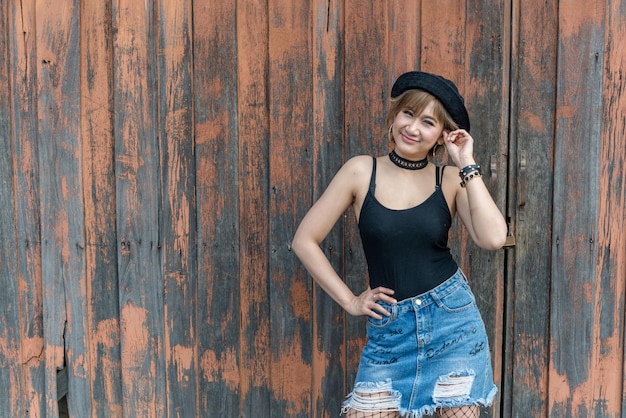 Portrait of beautiful asian woman new look with short hairsBlack dress with skirt jeans outdoorthailand people