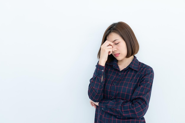 Portrait of beautiful asian woman sad and stress on white backgroundThailand people serious and worry about loveA girl think concept