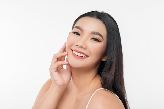 Portrait of beautiful asian woman with black hair and pink lips