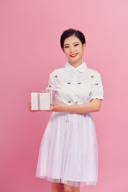 Portrait of beautiful asian woman with gift box