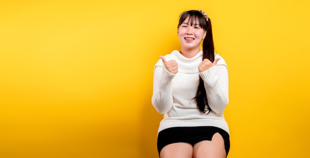 Portrait of a beautiful Asian woman with a smiling face Asian woman wearing casual clothes Thai