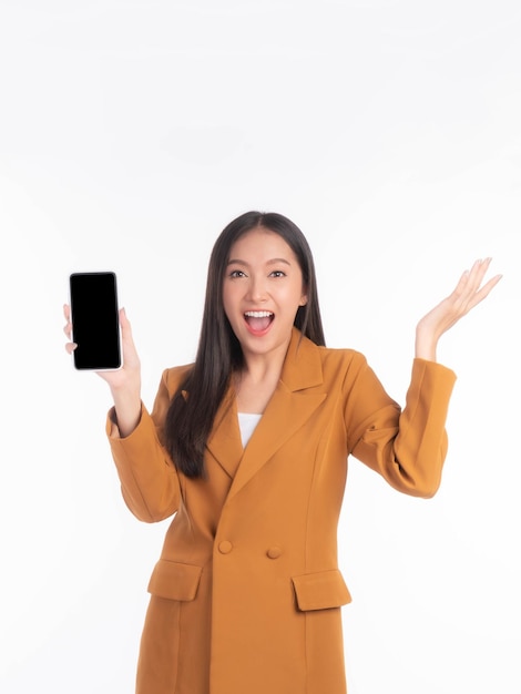 Portrait of beautiful Asian young woman showing smart phone with blank screen black screen empty copy space for advertising banner isolated on white background Mock Up Image