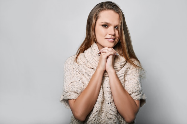 Portrait of beautiful blond woman in studio