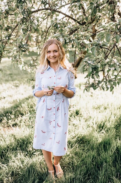 Portrait of a beautiful blonde outdoors in the park