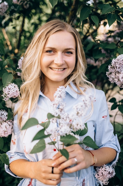 Portrait of a beautiful blonde outdoors in the park