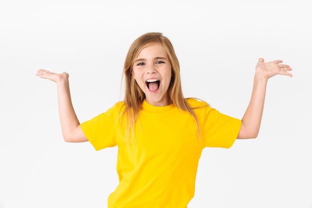 Photo portrait of beautiful blonde summer girl wearing casual t-shirt rejoicing and throwing up hands isolated on white