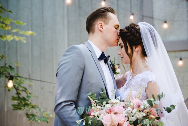 Portrait of a beautiful bride and groom