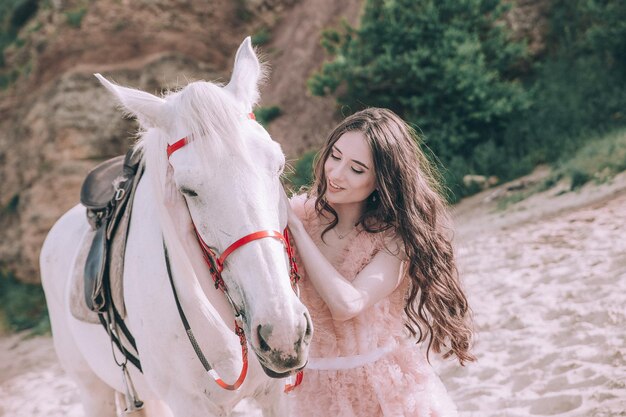 portrait of a beautiful bride and horse