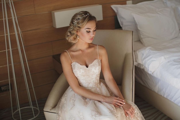 Portrait of a beautiful bride in a hotel room