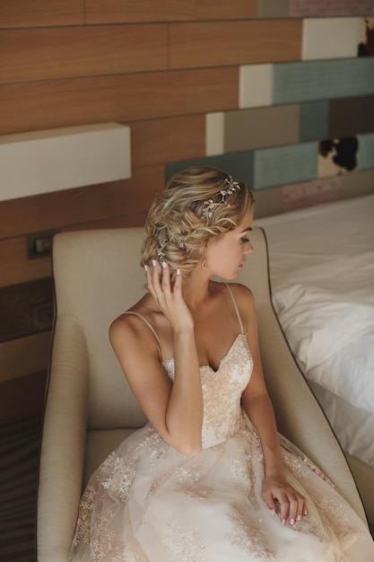 Portrait of a beautiful bride in a hotel room