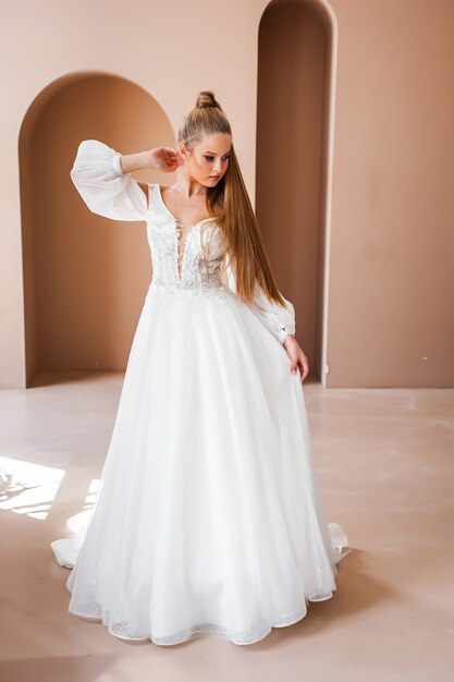 Portrait of a beautiful bride in the interior