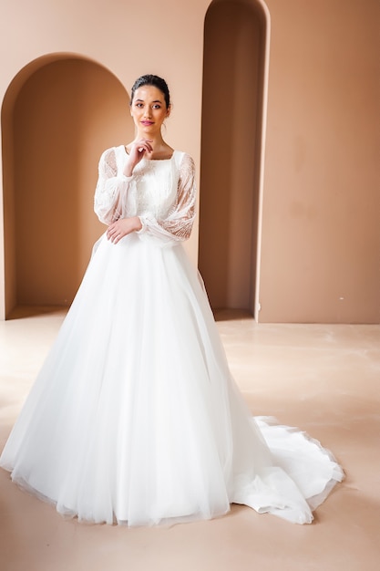 Portrait of a beautiful bride in the interior