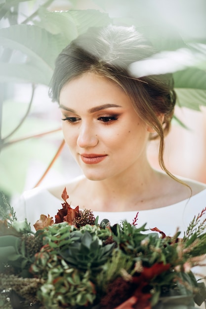 Portrait of a beautiful bride in a modest dress.