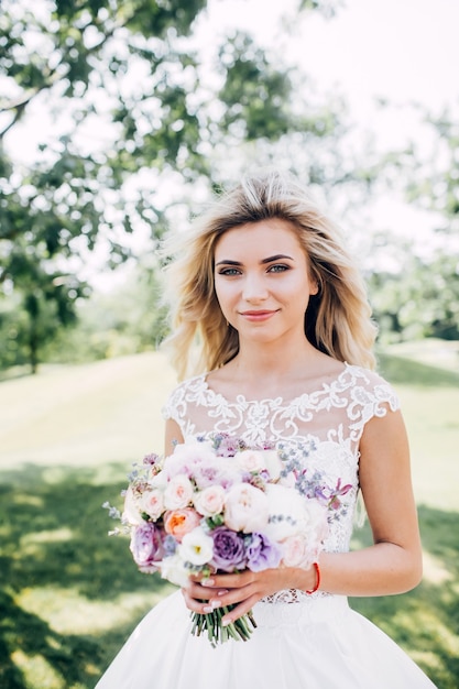 Portrait of a beautiful bride in nature