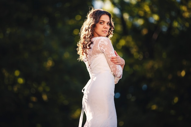 Portrait of a beautiful bride in nature