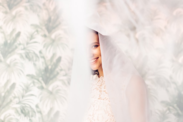 Portrait of a beautiful bride in veil