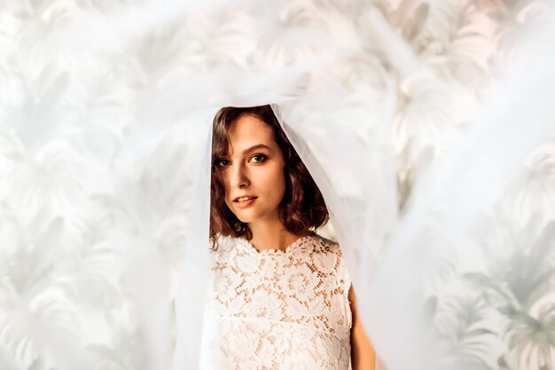 Portrait of a beautiful bride in veil