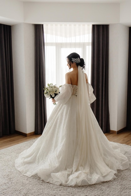 Portrait of a beautiful bride in a white dress.