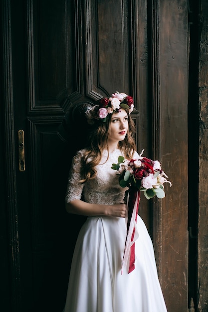 Portrait of a beautiful bride in a wreath wedding day rustic stylex9xA