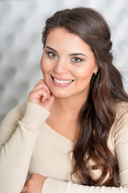 Portrait of a beautiful brunette woman, close up