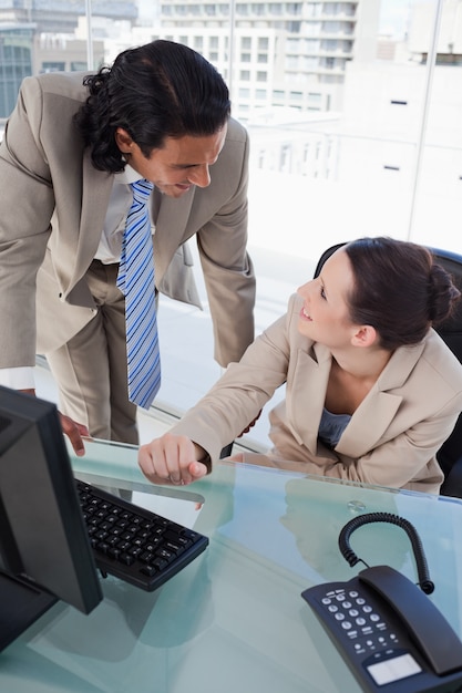 Portrait of a beautiful business team using a computer