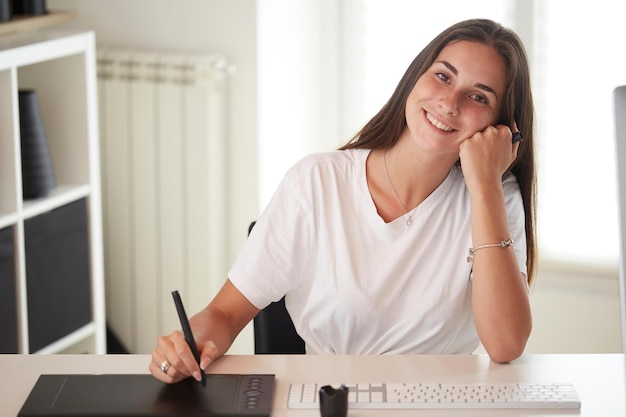 Portrait of beautiful caucasian photographer woman holding camera Business people employee freelanc