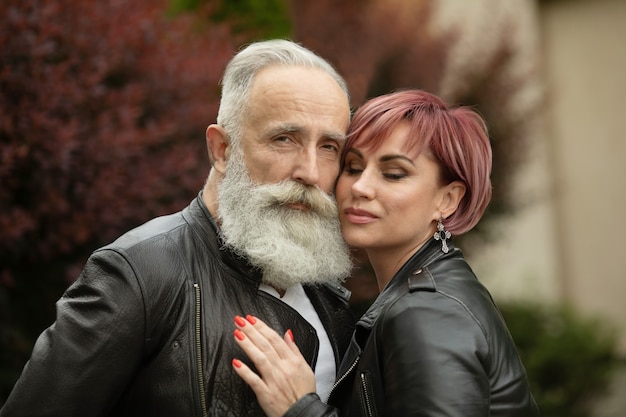 Portrait of beautiful caucasian senior couple posing outdoor.