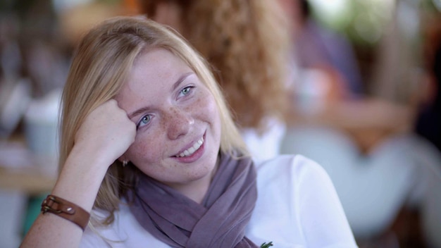 Portrait of beautiful caucasian woman in cafeteria