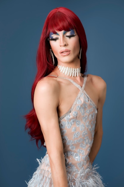 Photo portrait of beautiful drag person wearing makeup and wig