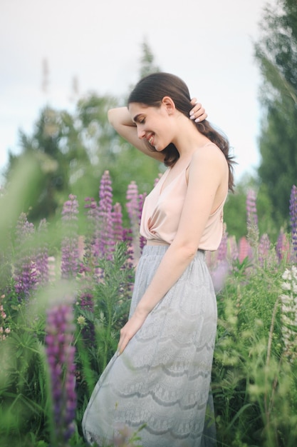 Portrait of a beautiful expressive brunette girl in nature