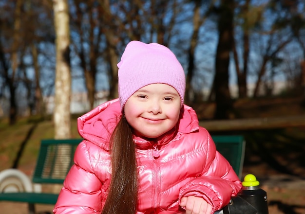 Portrait of beautiful girl on the playground