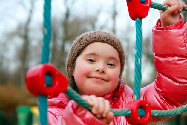 Portrait of beautiful girl on the playground