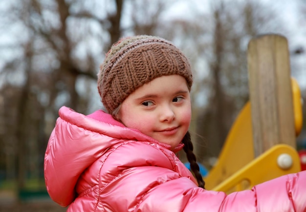 Portrait of beautiful girl on the playground