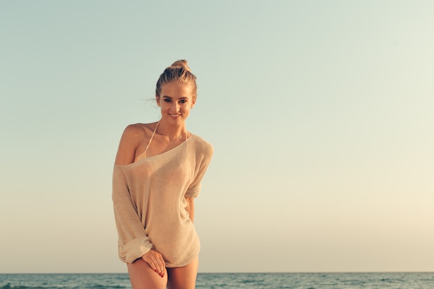 Portrait of a beautiful girl at the sea