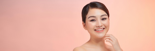 Portrait of beautiful girl smiling looking at camera