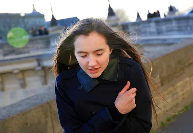 Portrait of the beautiful girl that have cold in Paris