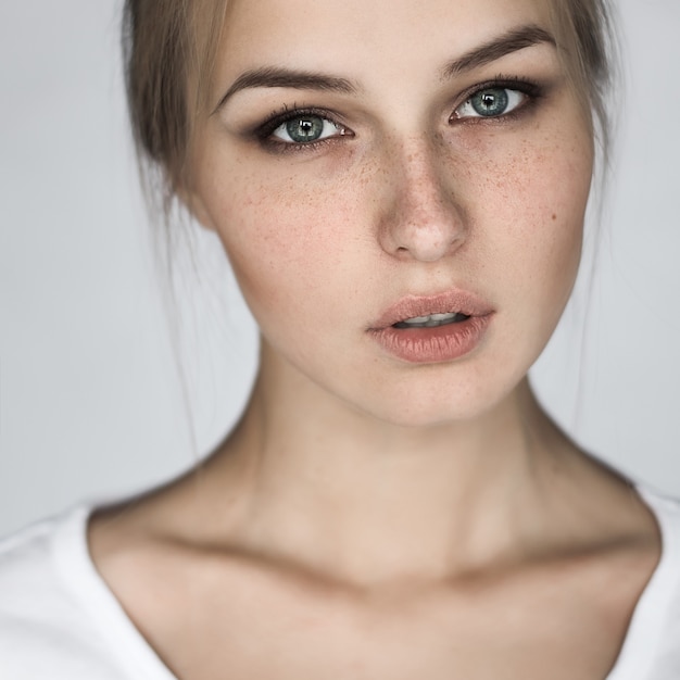 Portrait of a beautiful girl with close-up