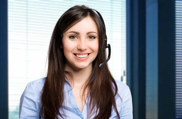 Portrait of a beautiful girl with headset