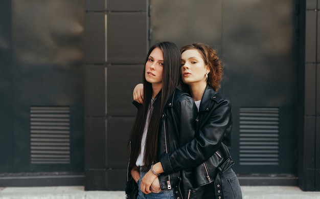 Portrait of beautiful girls in leather jackets