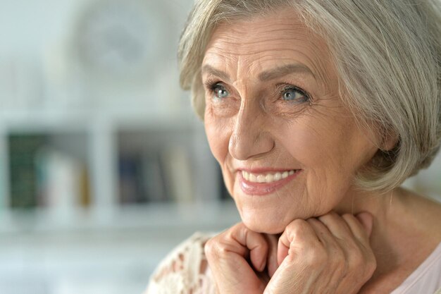 Portrait of a beautiful happy elderly woman closeup