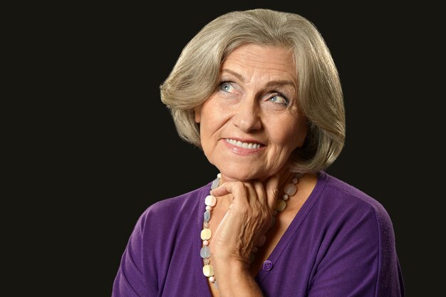 Photo portrait of a beautiful happy elderly woman